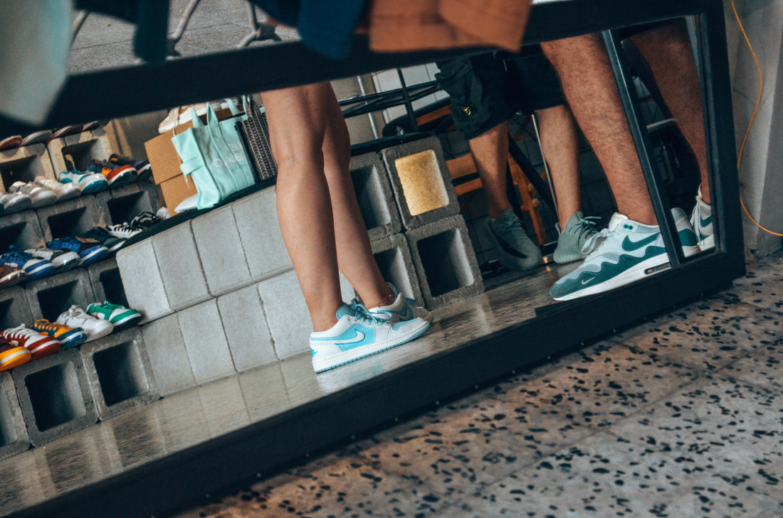 How have Nike, Adidas, New Balance, and Asics contributed to the evolution of the sneaker industry?